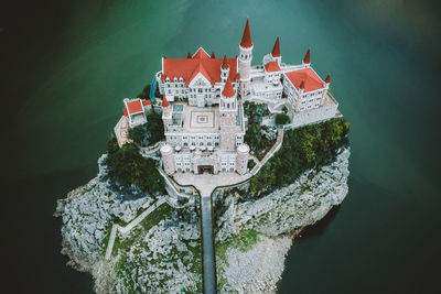 High angle view of river amidst buildings