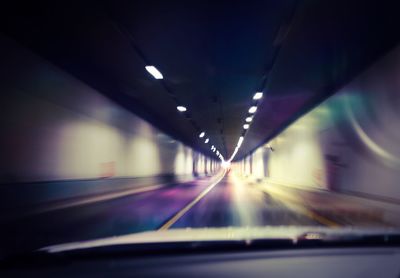 Close-up of illuminated car on road