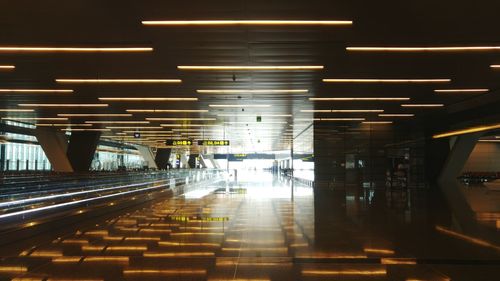 Interior of illuminated subway station