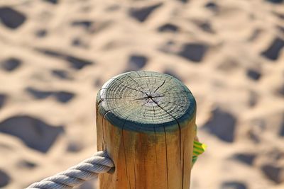 High angle view of wooden post on beach