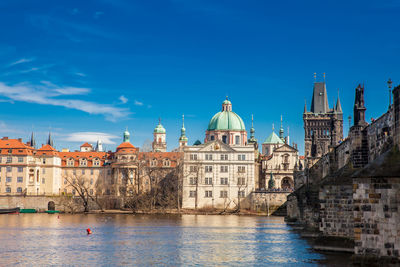 The beautiful old town of prague city, the vltava river and the iconic charles bridge