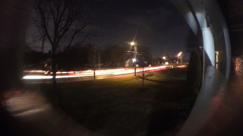 Illuminated street at night