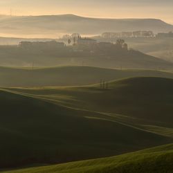 Scenic view of landscape against sky during sunset