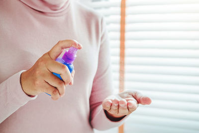 Close-up of woman holding hands