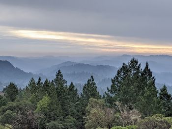 Scenic view of mountains against sky during sunset