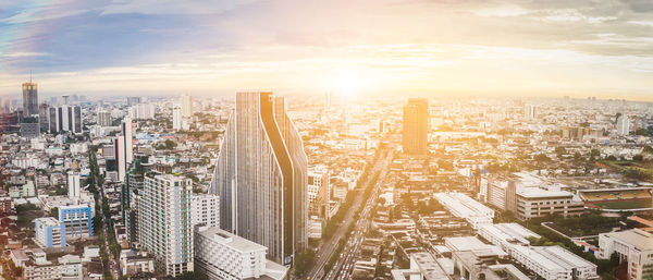 High angle view of cityscape against sky during sunset