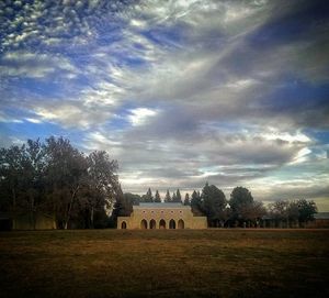 Castle against cloudy sky