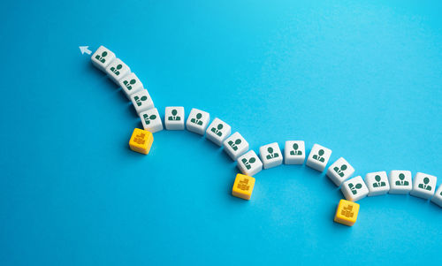 Close-up of toy blocks on blue background