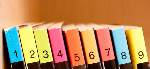 Close-up of numbers on books in library