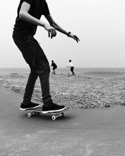 Full length of man playing on beach