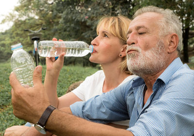 Portrait of a man drinking glass