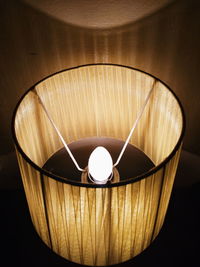 Close-up of electric lamp on table