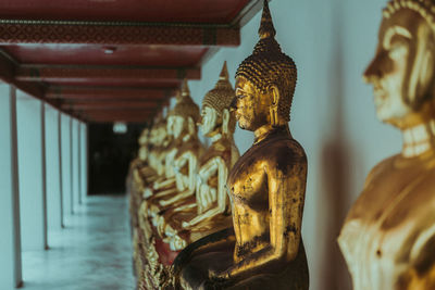 Statue in temple outside building