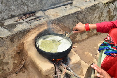 High angle view of woman preparing food