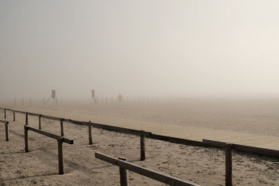 Scenic view of sea against sky during winter