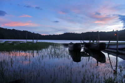 Scenic view of lake against sky during sunset