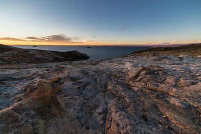 Scenic view of sea at sunset