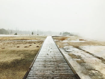 Yellowstone boardwalk into fog