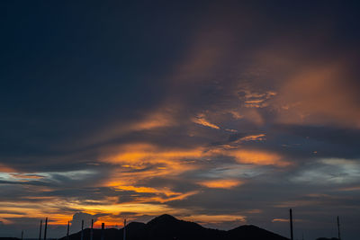 Low angle view of dramatic sky during sunset