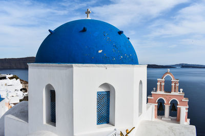 White building against blue sky