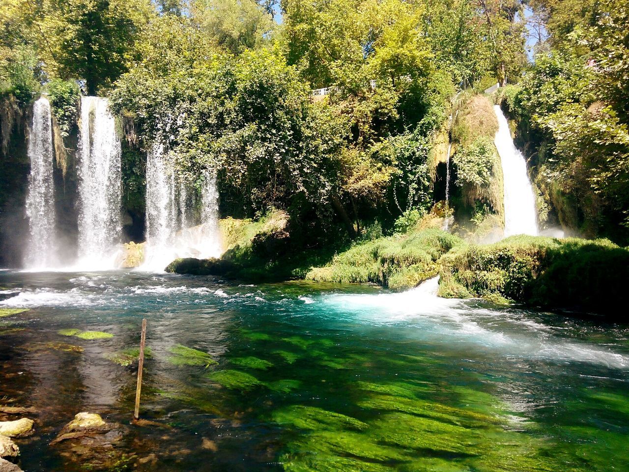 WATER FLOWING THROUGH ROCKS IN PARK