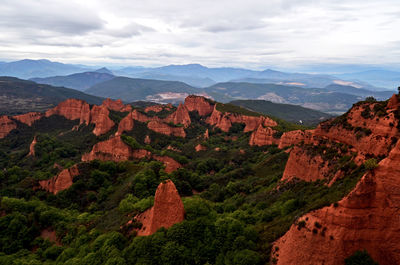 Idyllic shot of las medulas against cloudy sky