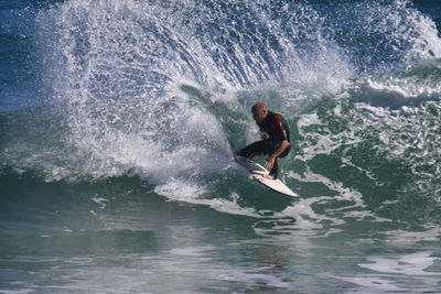 Man surfing in sea