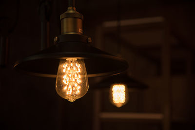 Close-up of illuminated light bulb