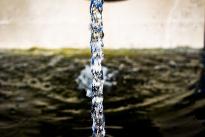 Close-up of water falling from fountain