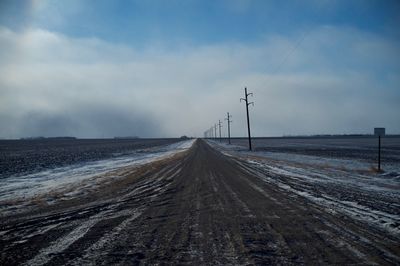 Road passing through field