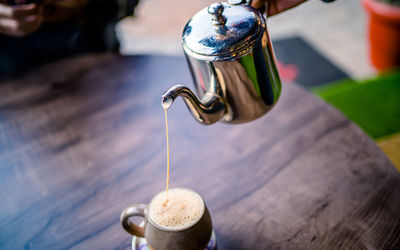 Close-up of coffee cup on table