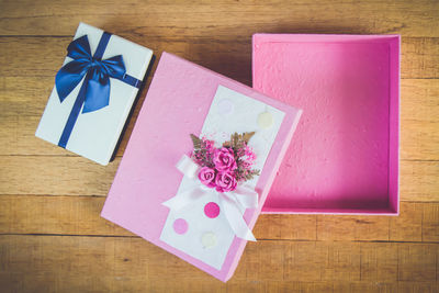 High angle view of pink flower on table
