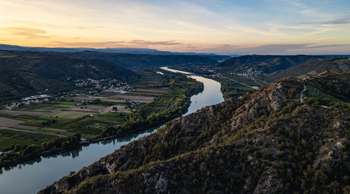 Scenic view of mountains against sky during sunset