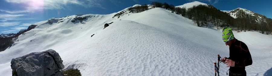 Scenic view of snow covered mountains