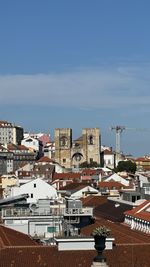 Buildings in city against sky