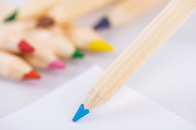 Close-up of colored pencils on table