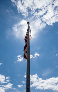 Low angle view of flag against sky