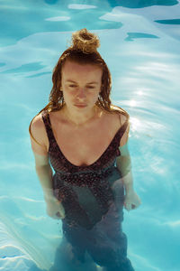 Young woman in swimming pool