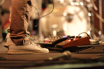 Low section of man standing on stage