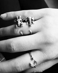 Close-up of finger wearing rings