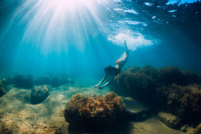 Man swimming in sea