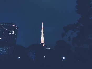 Low angle view of illuminated building at night