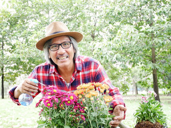 Portrait of a smiling young man wearing hat