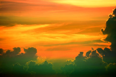 Scenic view of dramatic sky during sunset