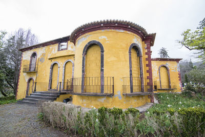 Low angle view of old building against clear sky