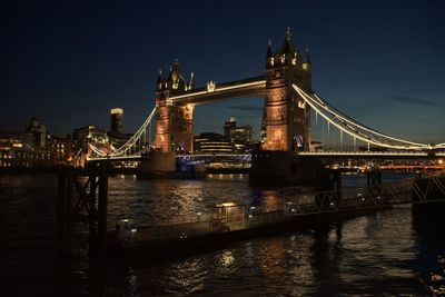 View of suspension bridge at night