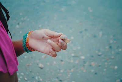 Close-up of woman holding hands