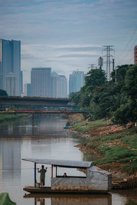 Bridge over river against sky