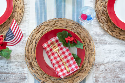 High angle view of candies in basket on table