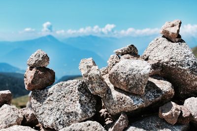 Close-up of rocks against sky